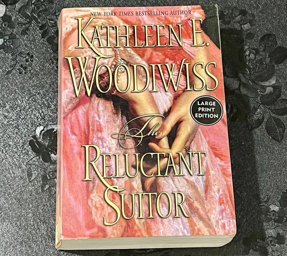 The Reluctant Suitor Kathleen E. Woodiwiss 2003